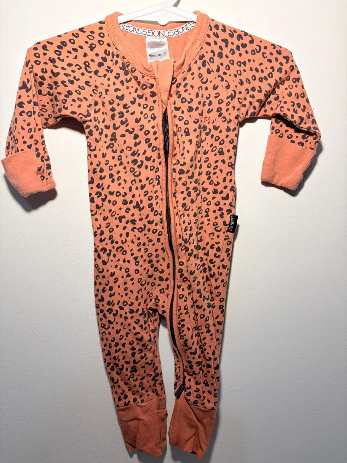 000 Bonds terracotta animal print wondersuit.