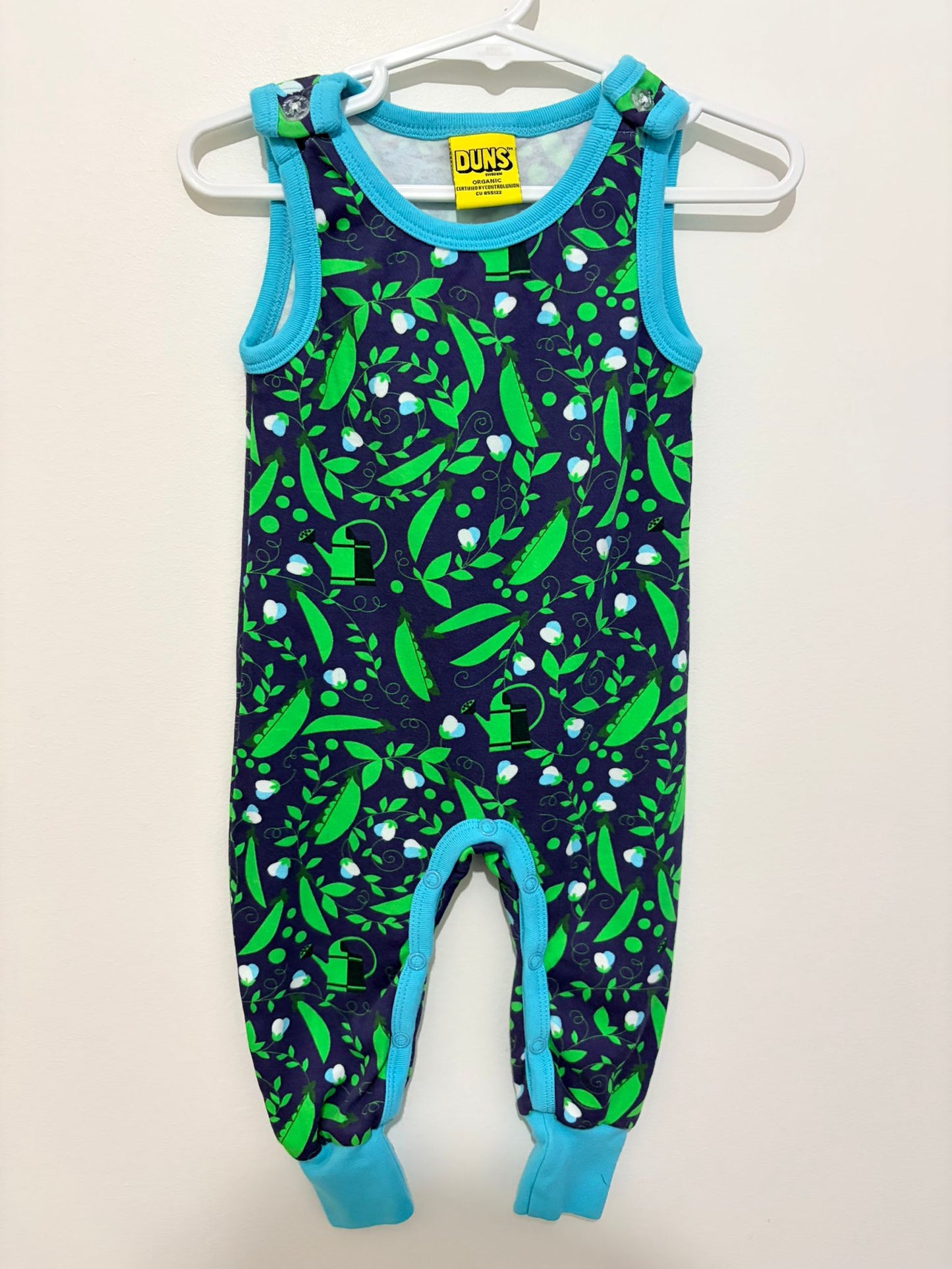 Size 00 Duns Sweeden gardening print onesie.