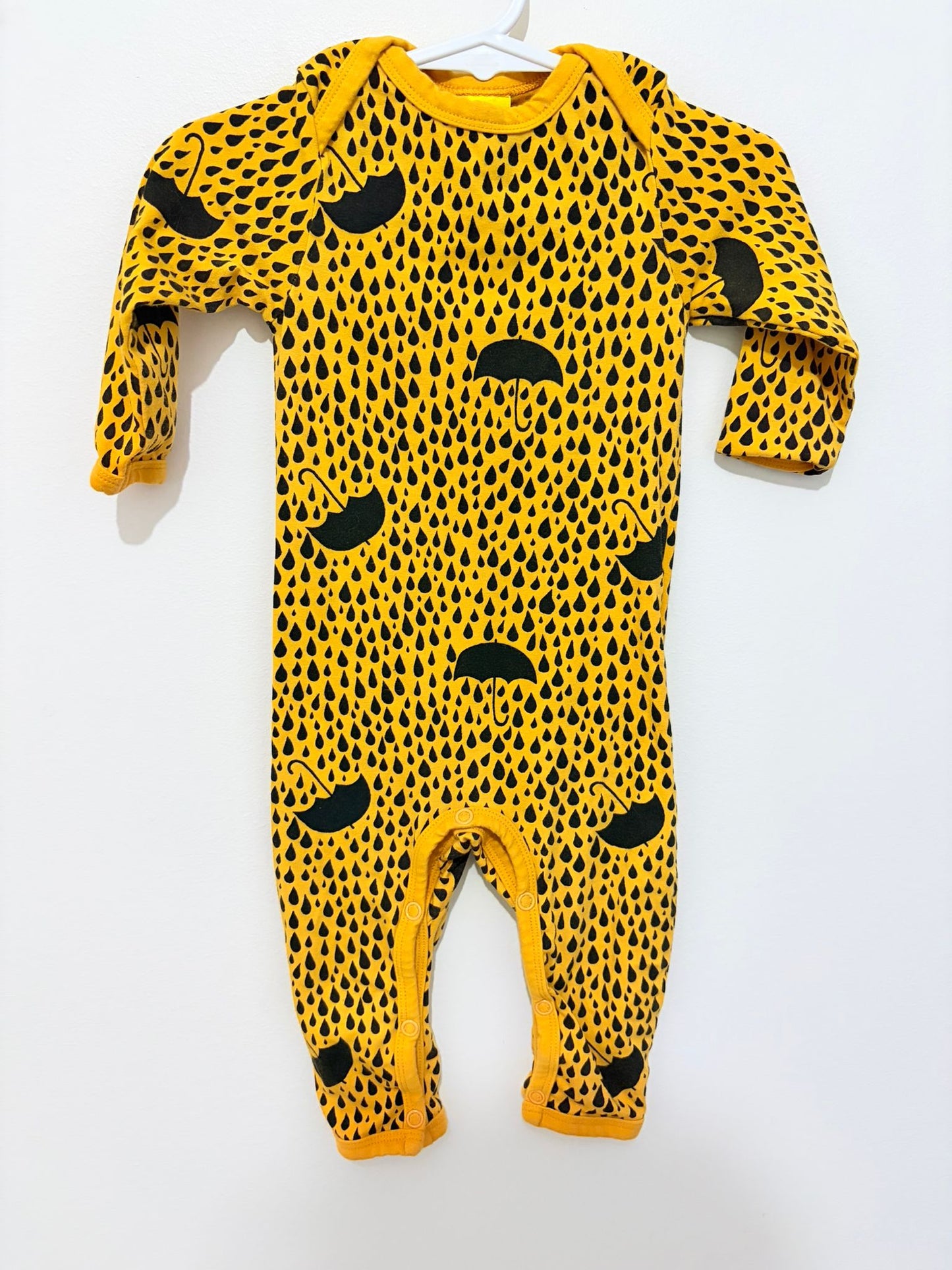 Size 00 More than a fling Scandi orange rain print onesie.