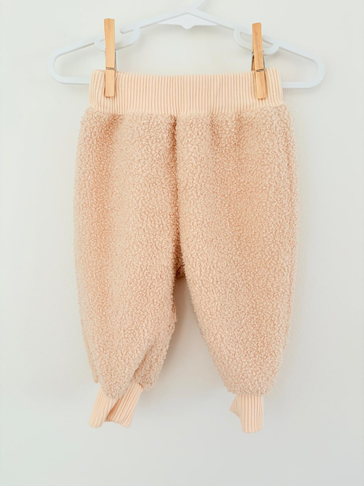 Size 00 Look at the label cream poodle pants/trousers.