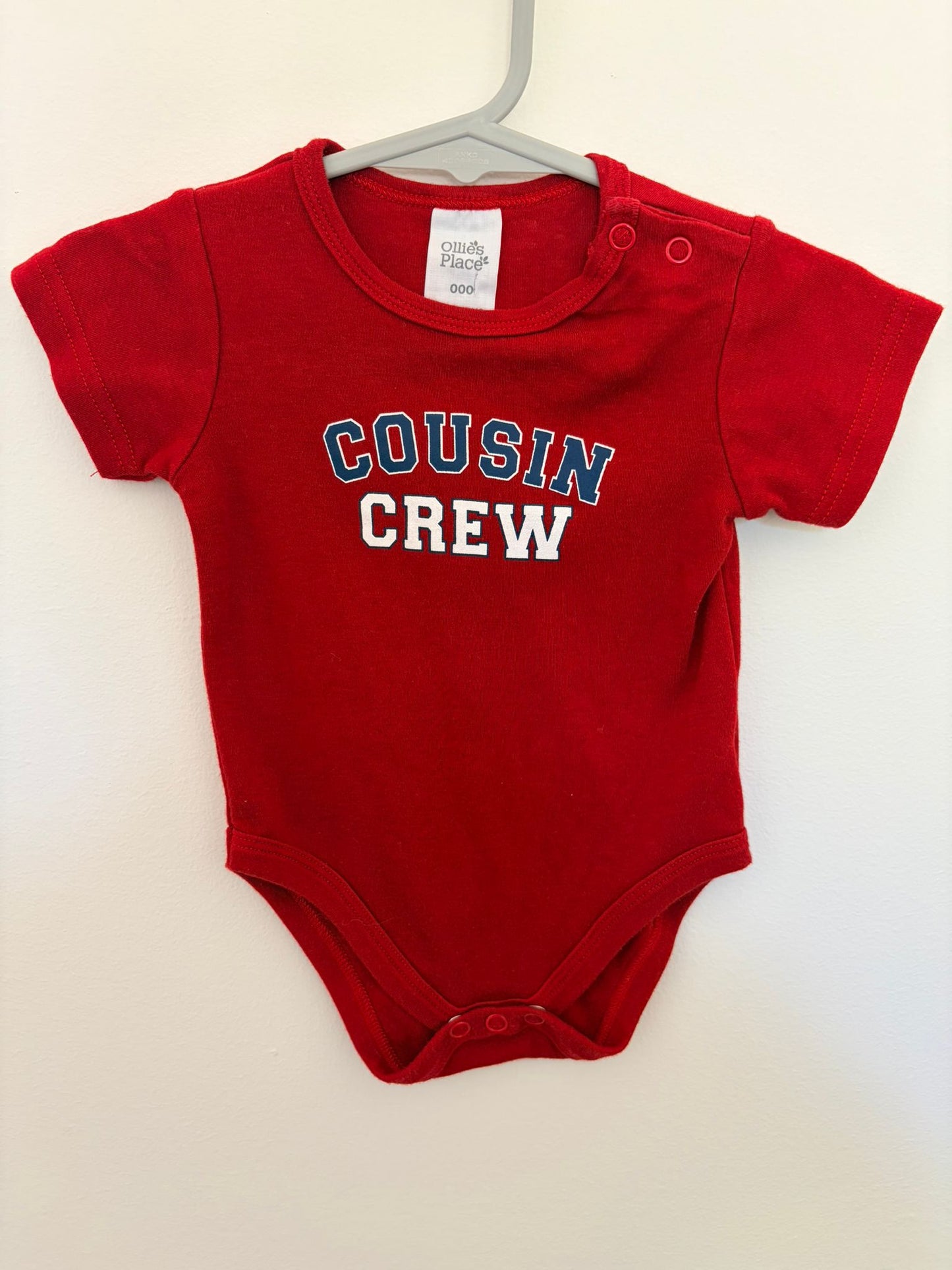 000 Ollie’s place cousin crew red bodysuit.