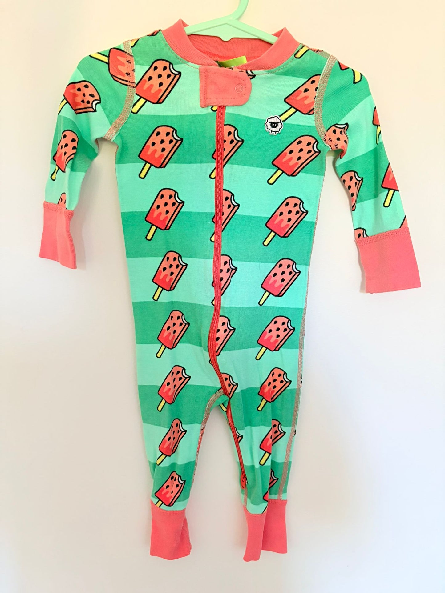 Size 0 MOODIE Ice block bold print onesie.