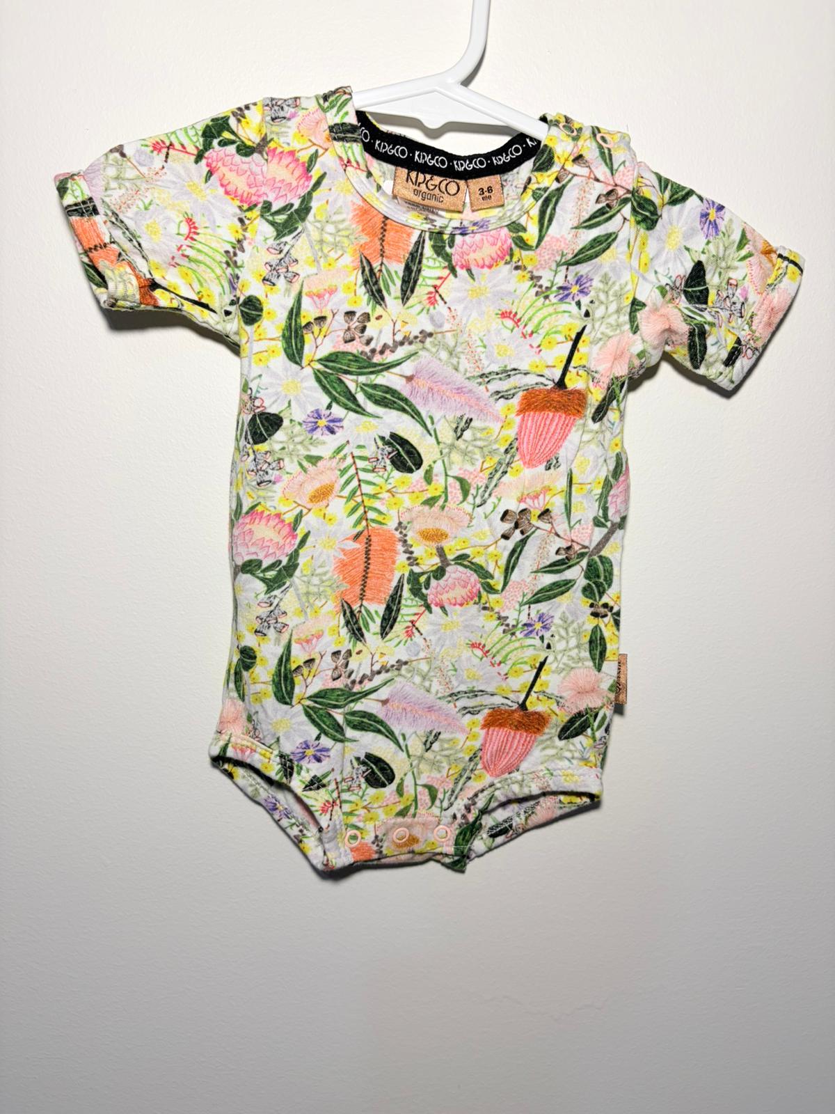 00 Kip & Co. Australian bush print short sleeve bodysuit.
