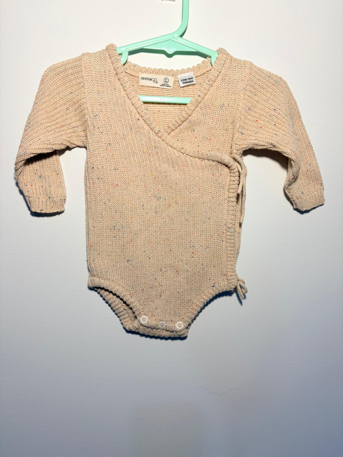 000 Miann & Co. knitted long sleeve body suit.