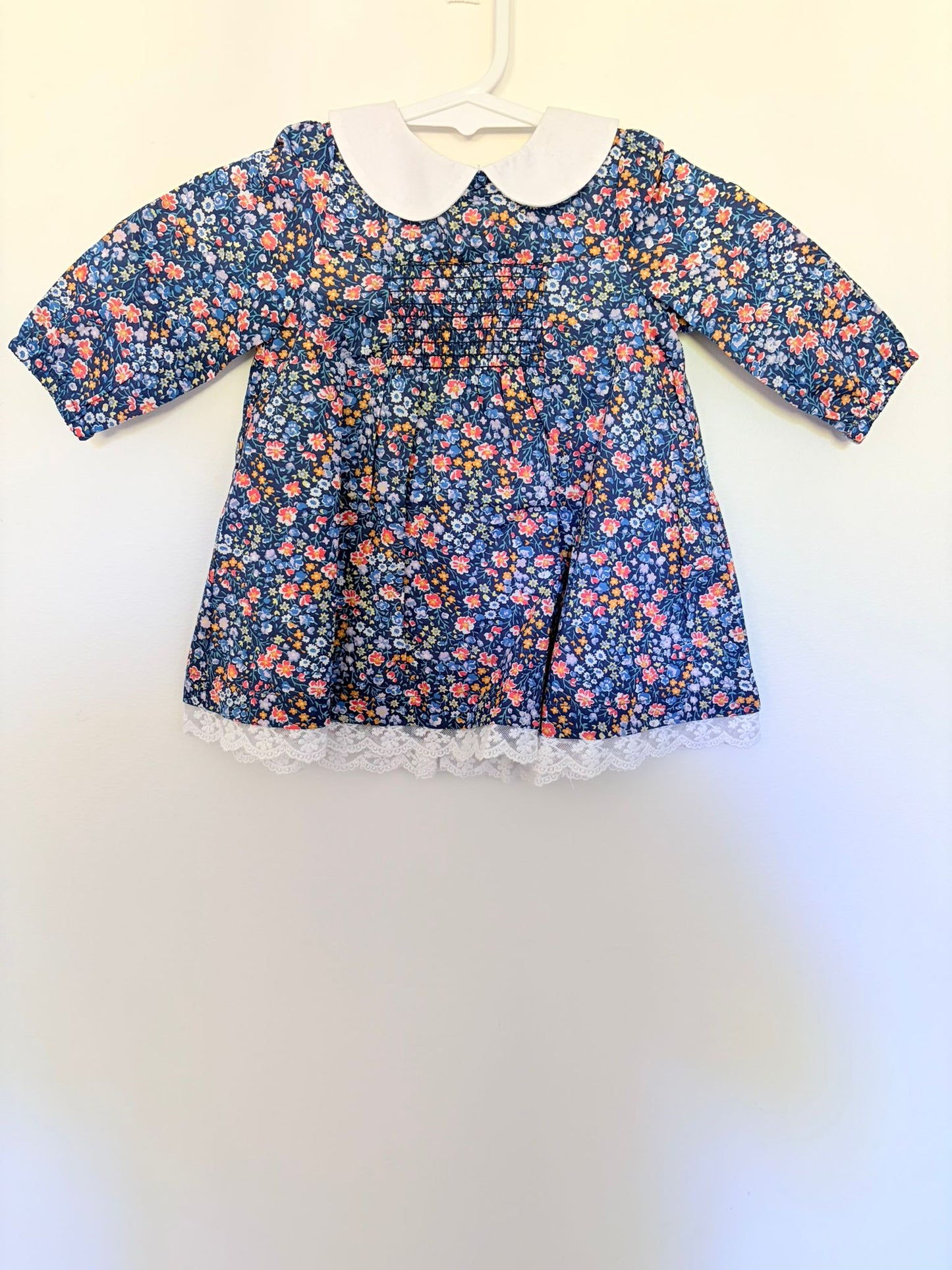 Size 000 BEBE cotton floral navy dress.