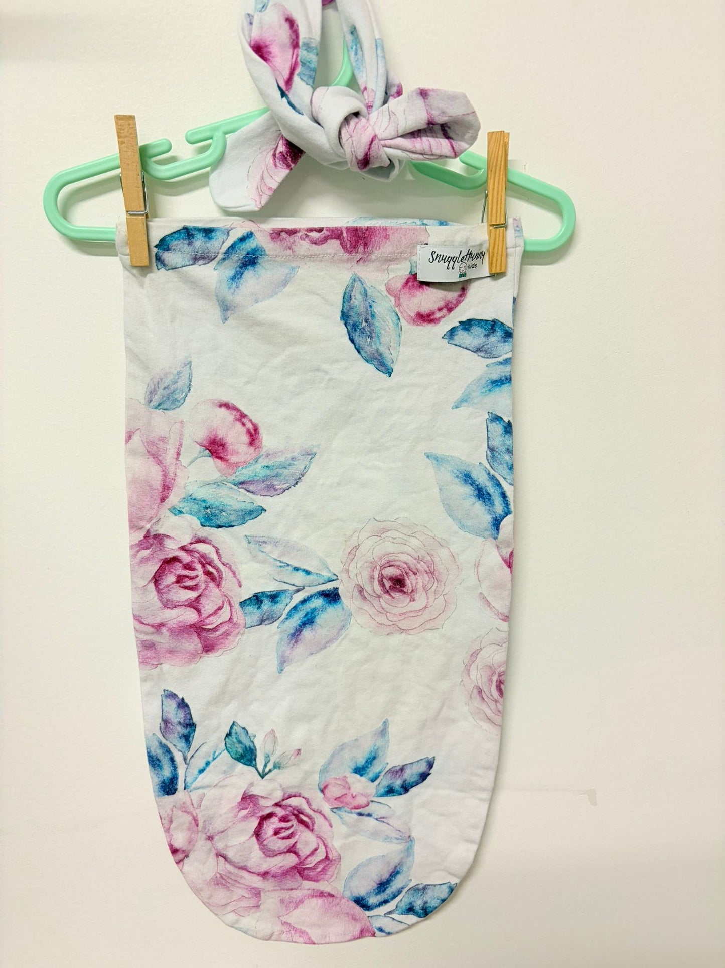 Newborn Snuggle honey wrap and headband pink rose print.