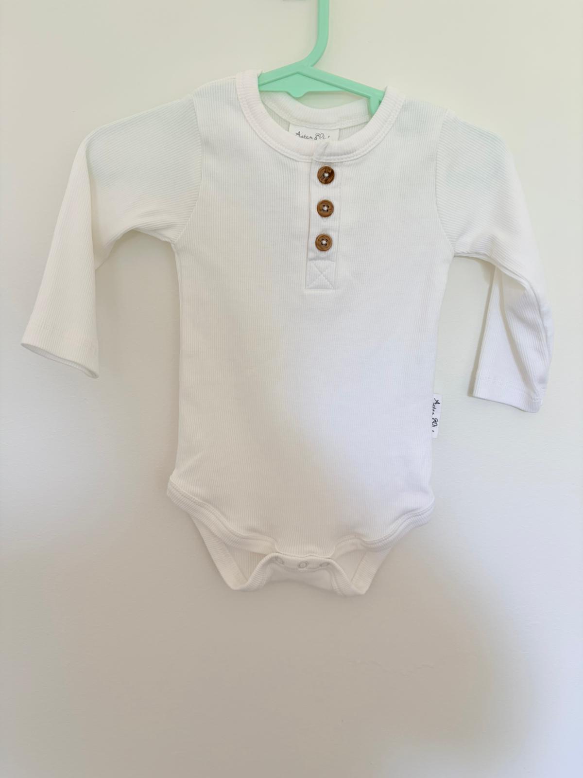 00 Aster & Oak long sleeve button up white body suit.