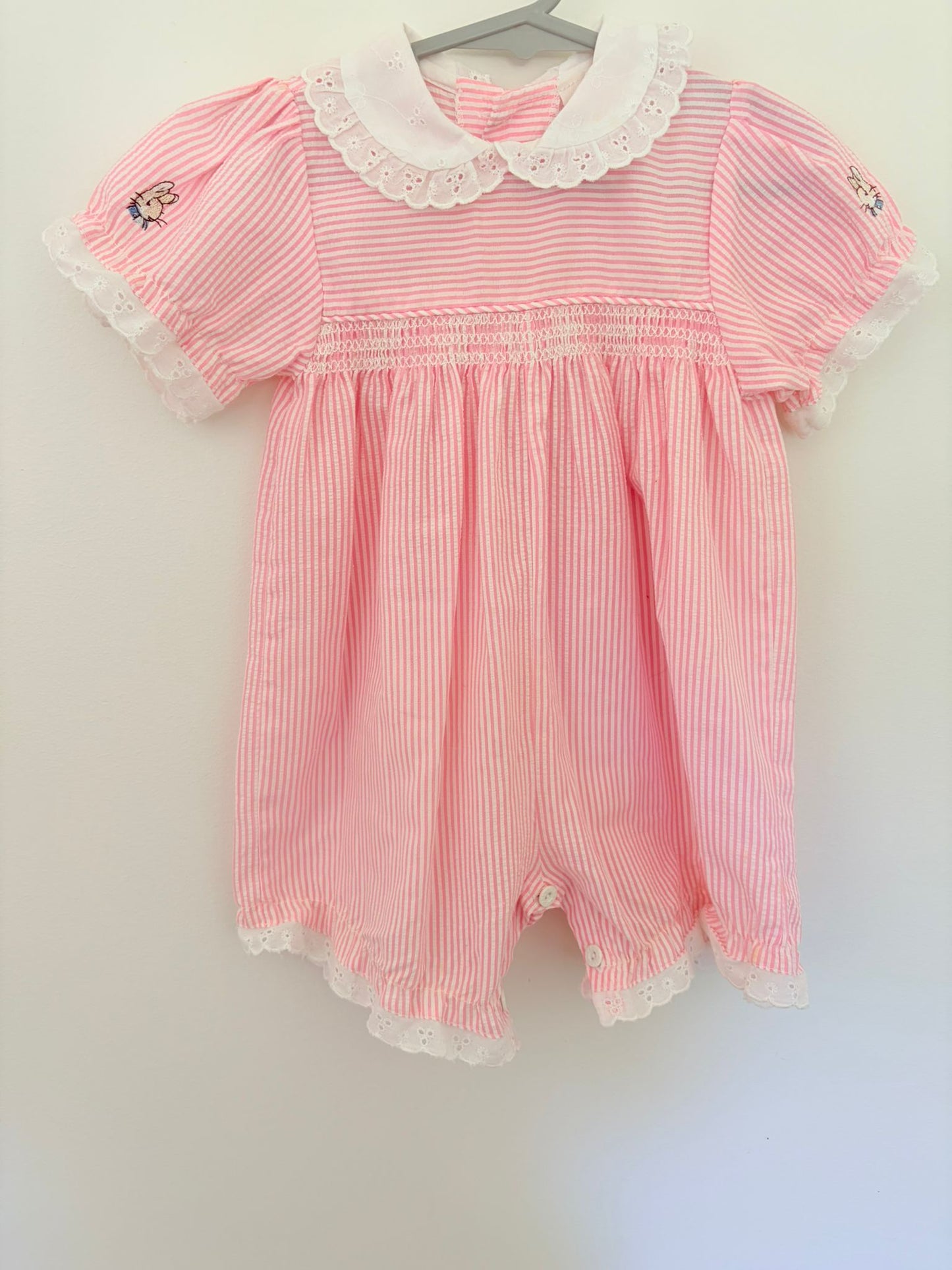 0 Vintage Peter Rabbit pink romper.