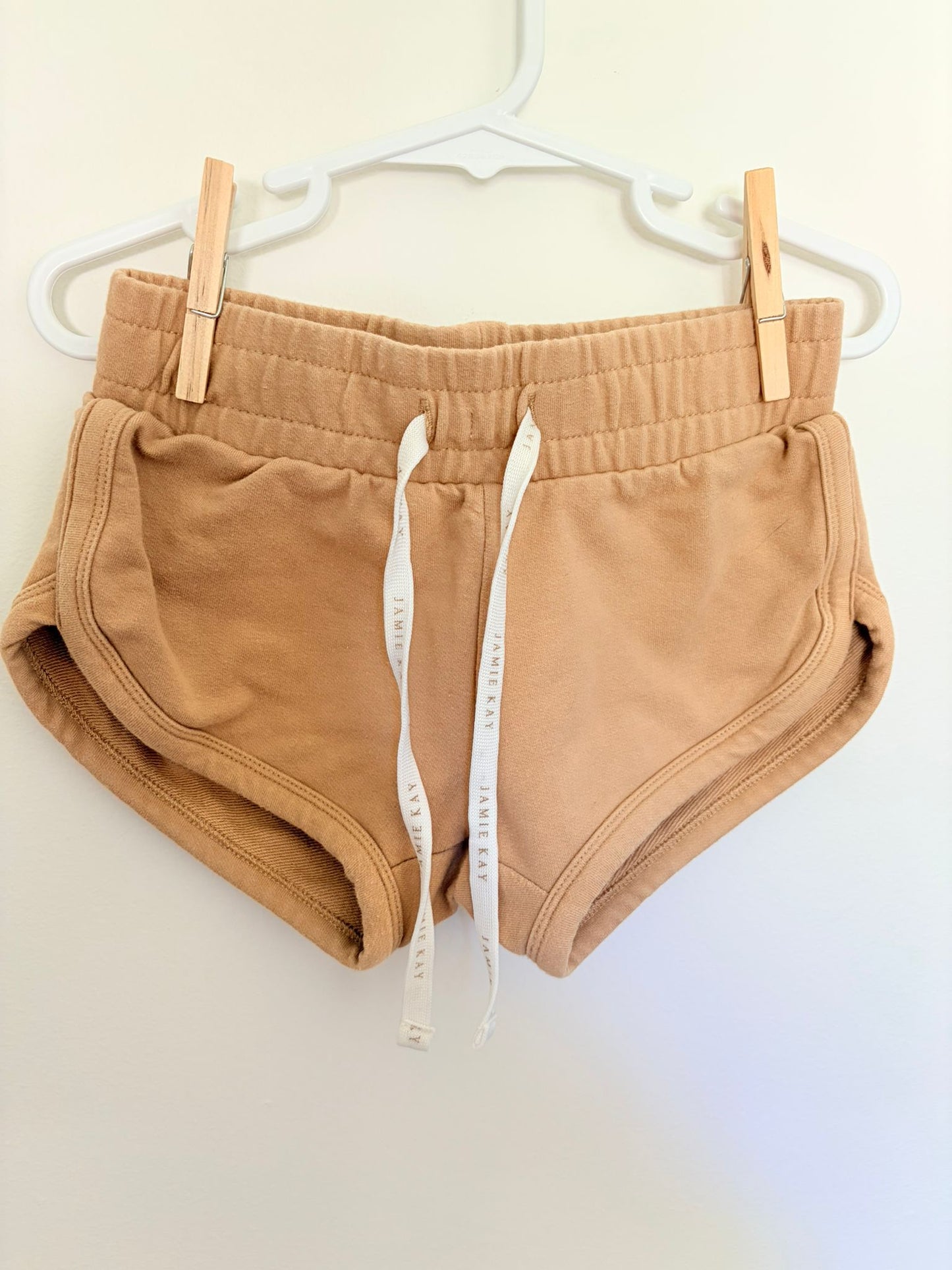 Size 4 Jaime Kay sand shorts.
