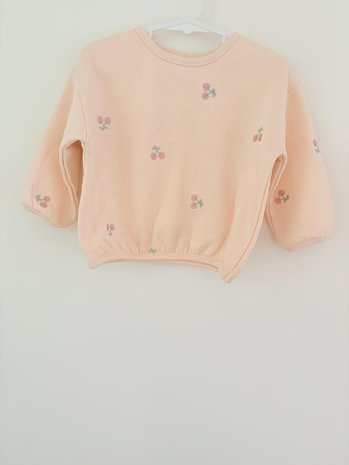 Size 1 Baby Berry peach jumper with cherry embroidery.