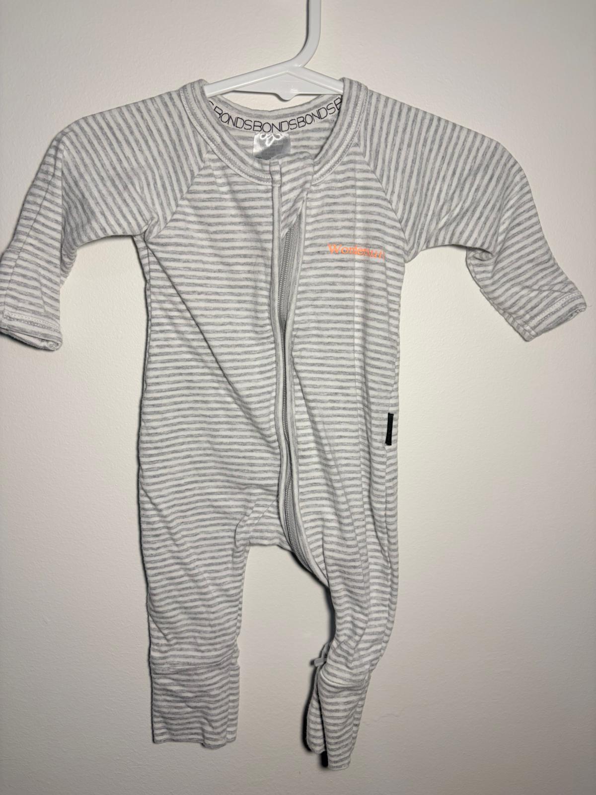 0000 Bonds wondersuit white and grey stripes.