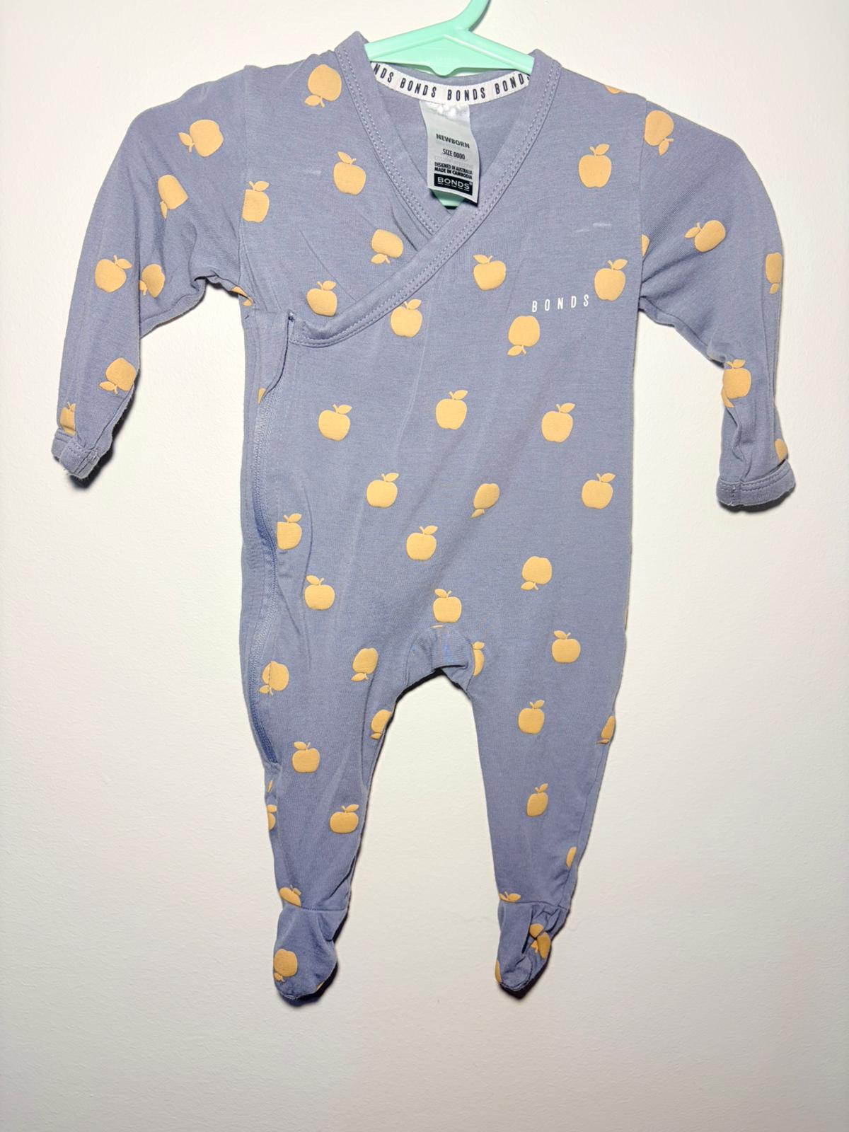 0000 Bonds crossover suit blue with apple print.