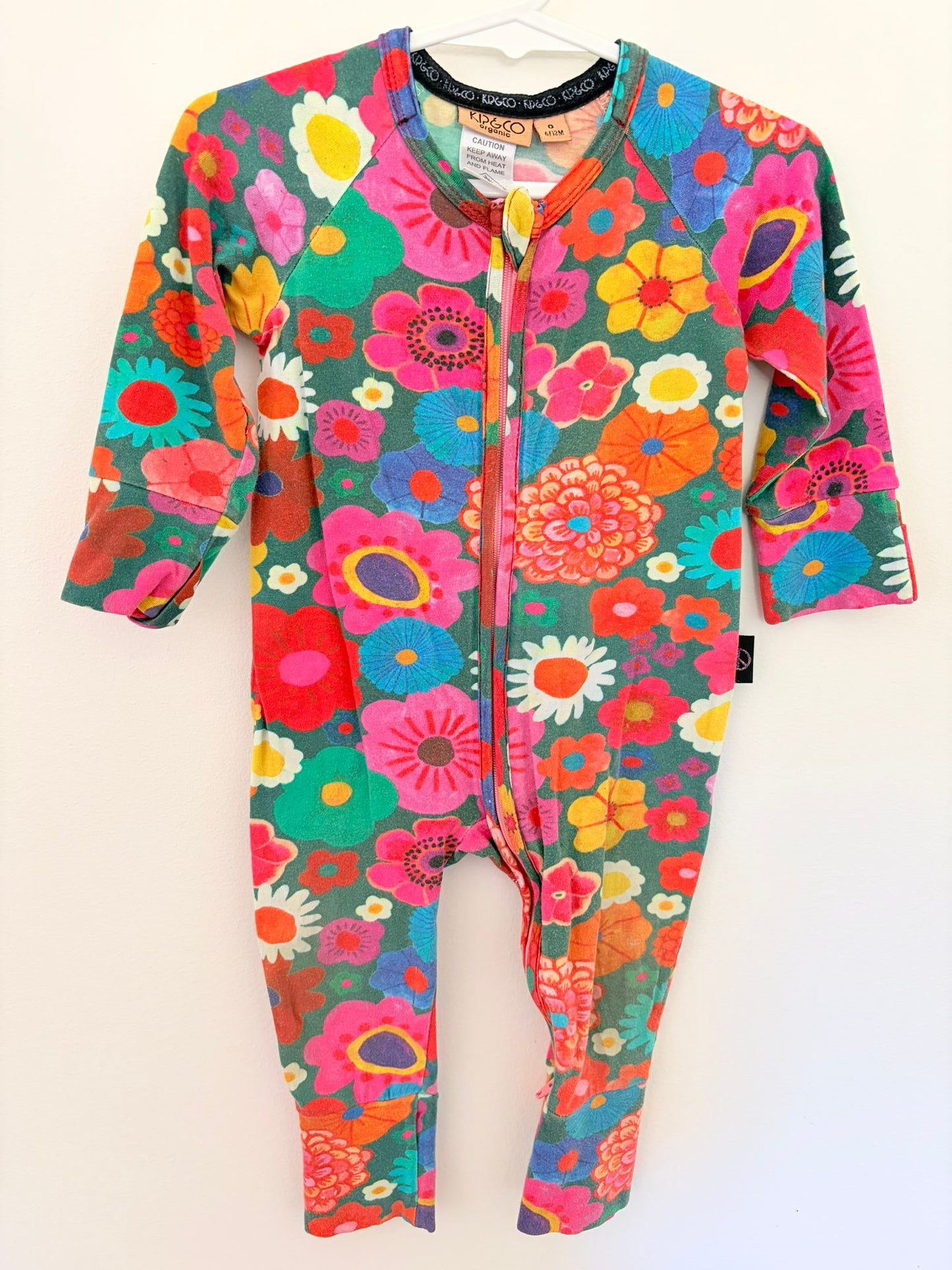 0 Kip & Co. bold print flowers onesie.