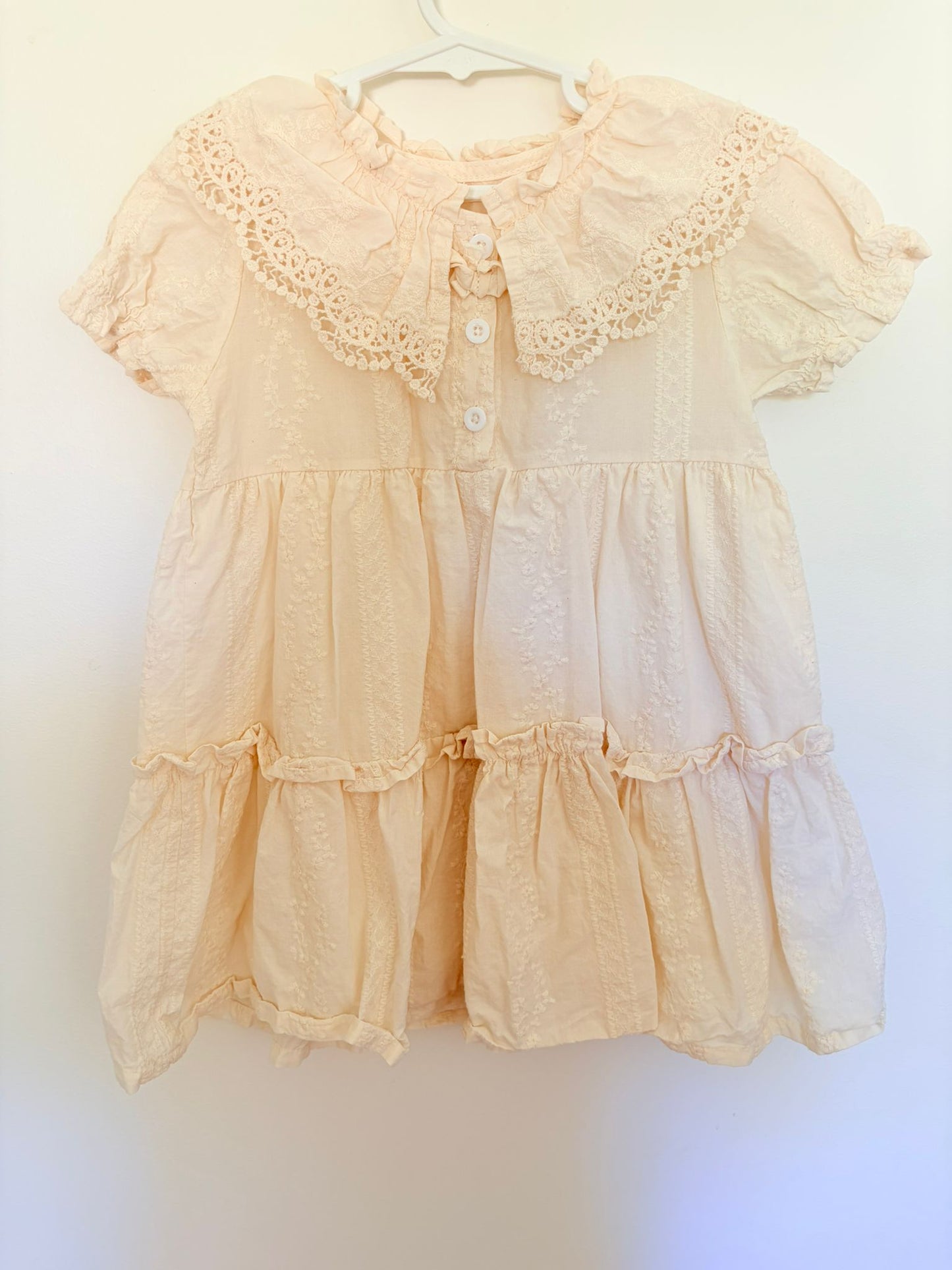 Size 3 (No label) cotton/ lined cream embroidered dress.