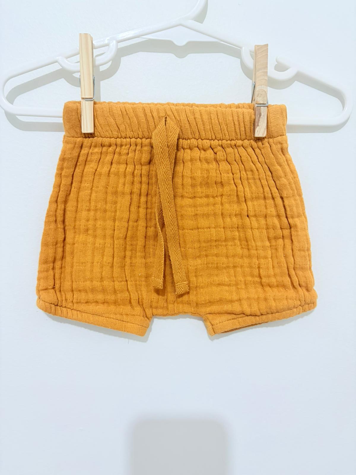 0000 Baby Berry mustard linen shorts.