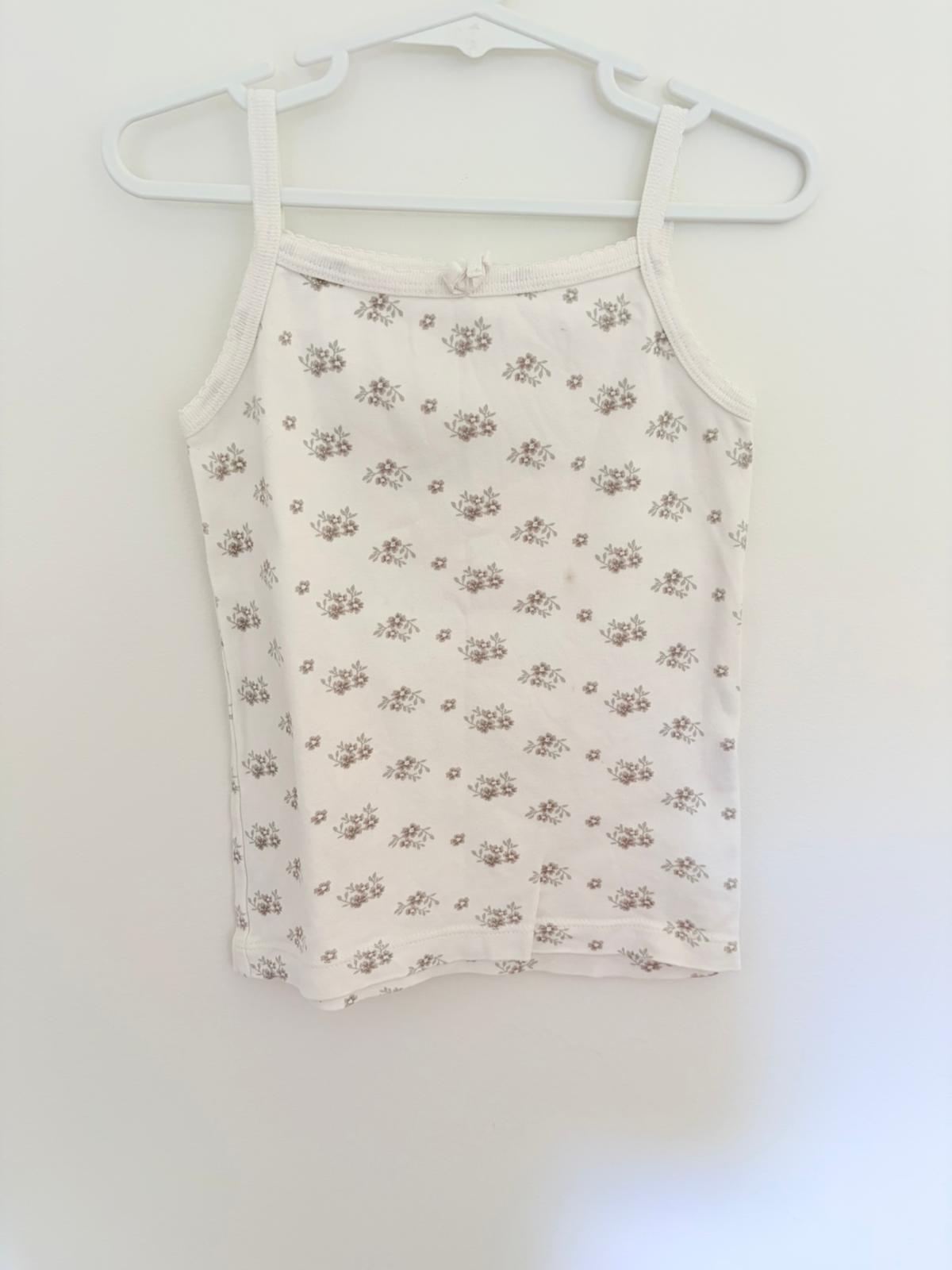 Size 4 Jamie Kay sleeveless white floral print top.