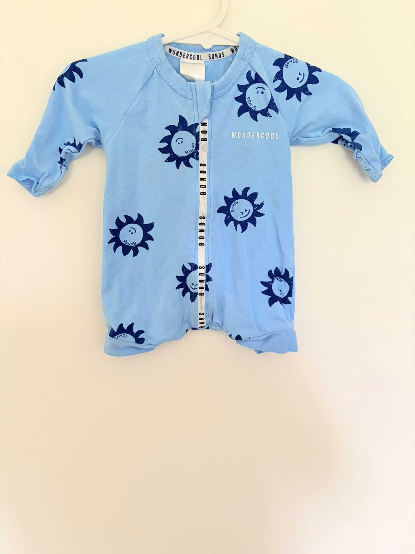 Newborn Long sleeved Wondersuit cool blue sun print.