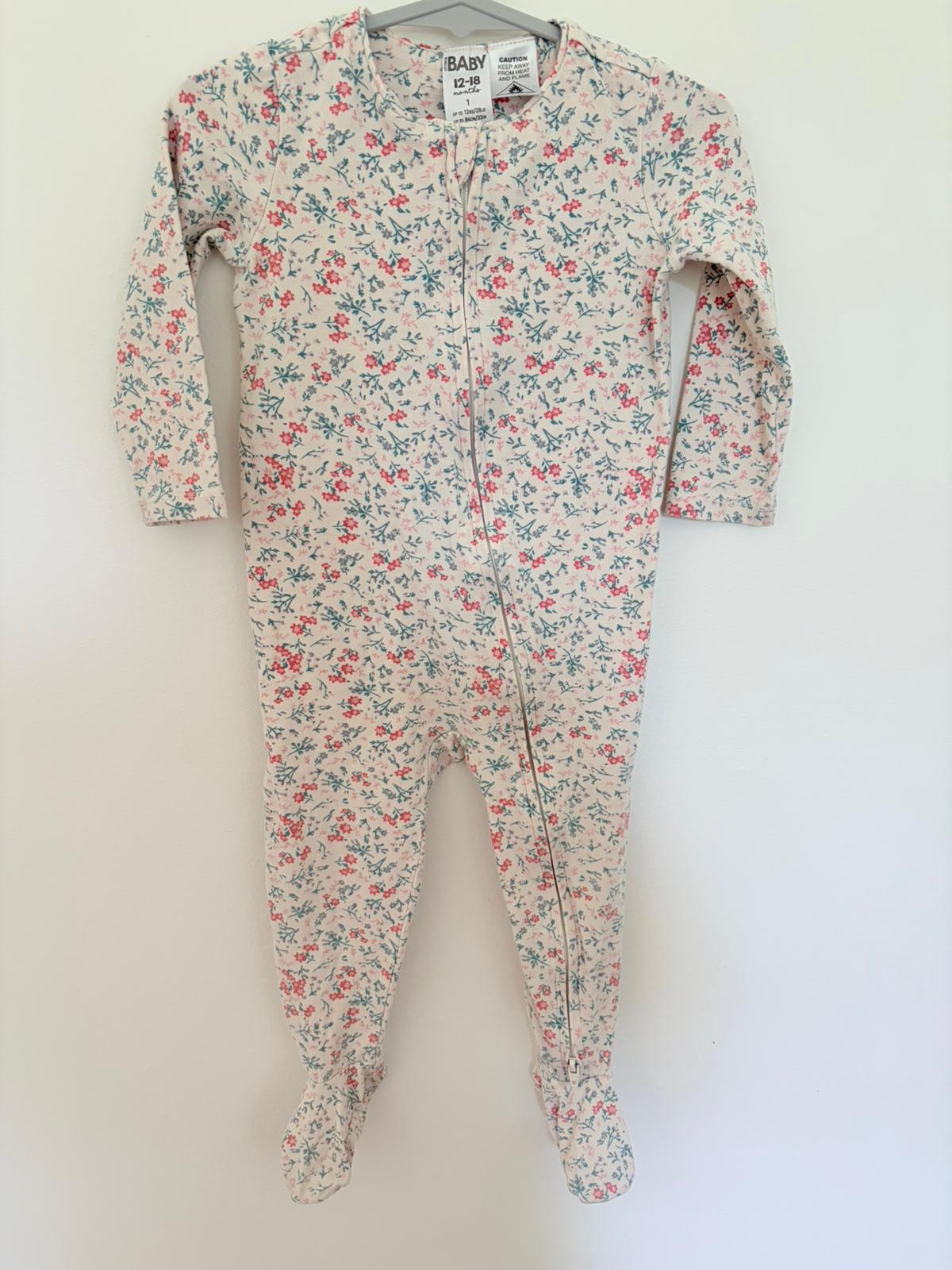 Size 1 Cotton on baby cream flower print onesie.