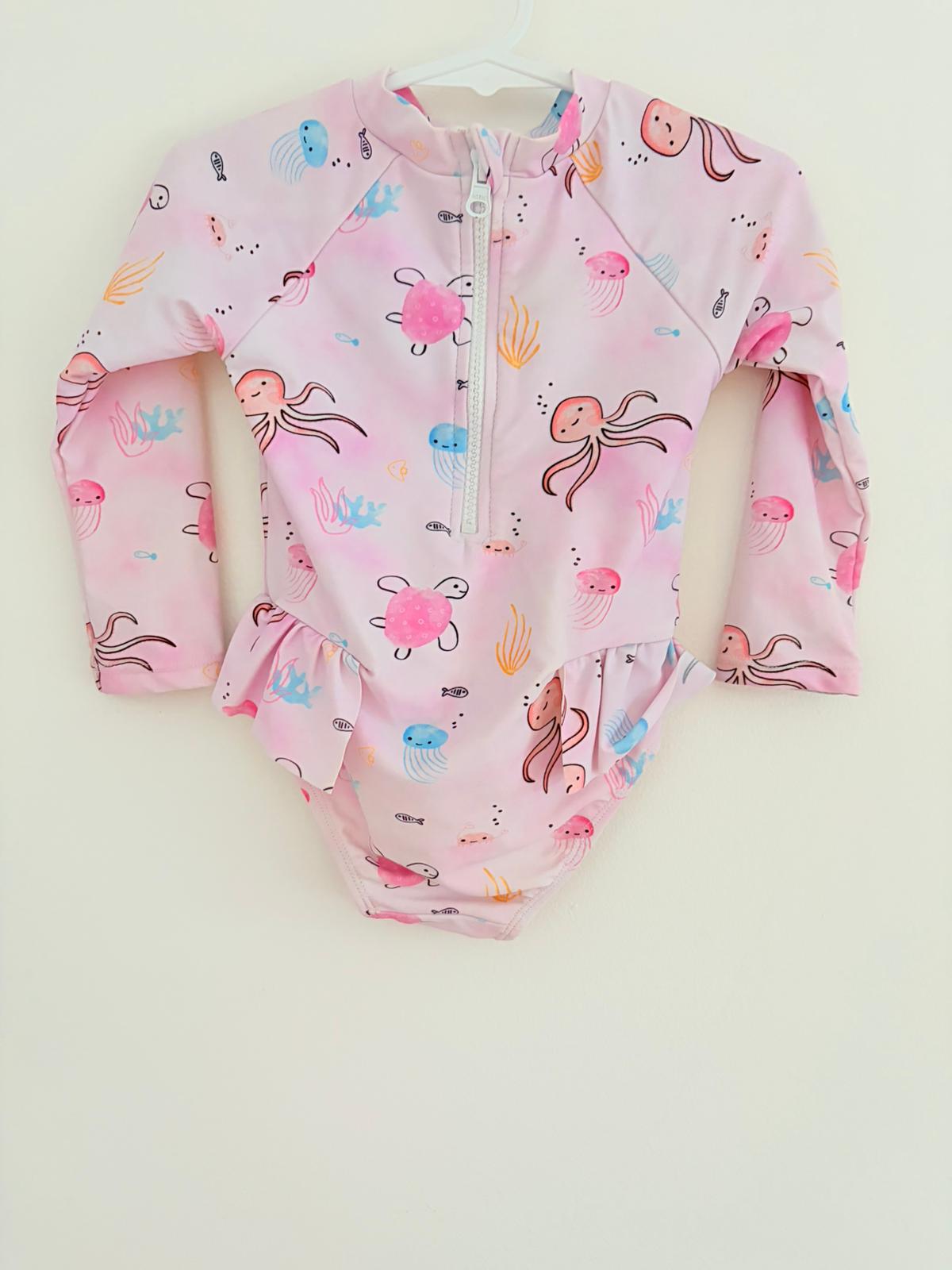 Swimwear Size 1 No label baby pink animal print swimsuit.