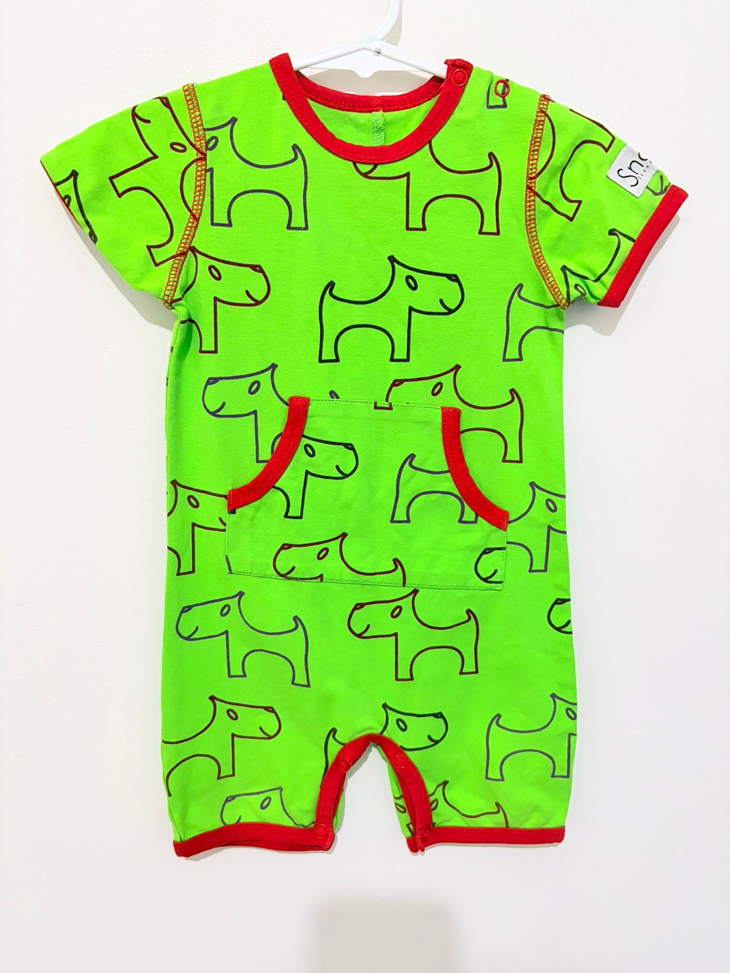 Size 0 SNOOZY Scandinavia organic cotton green dog print onesie.