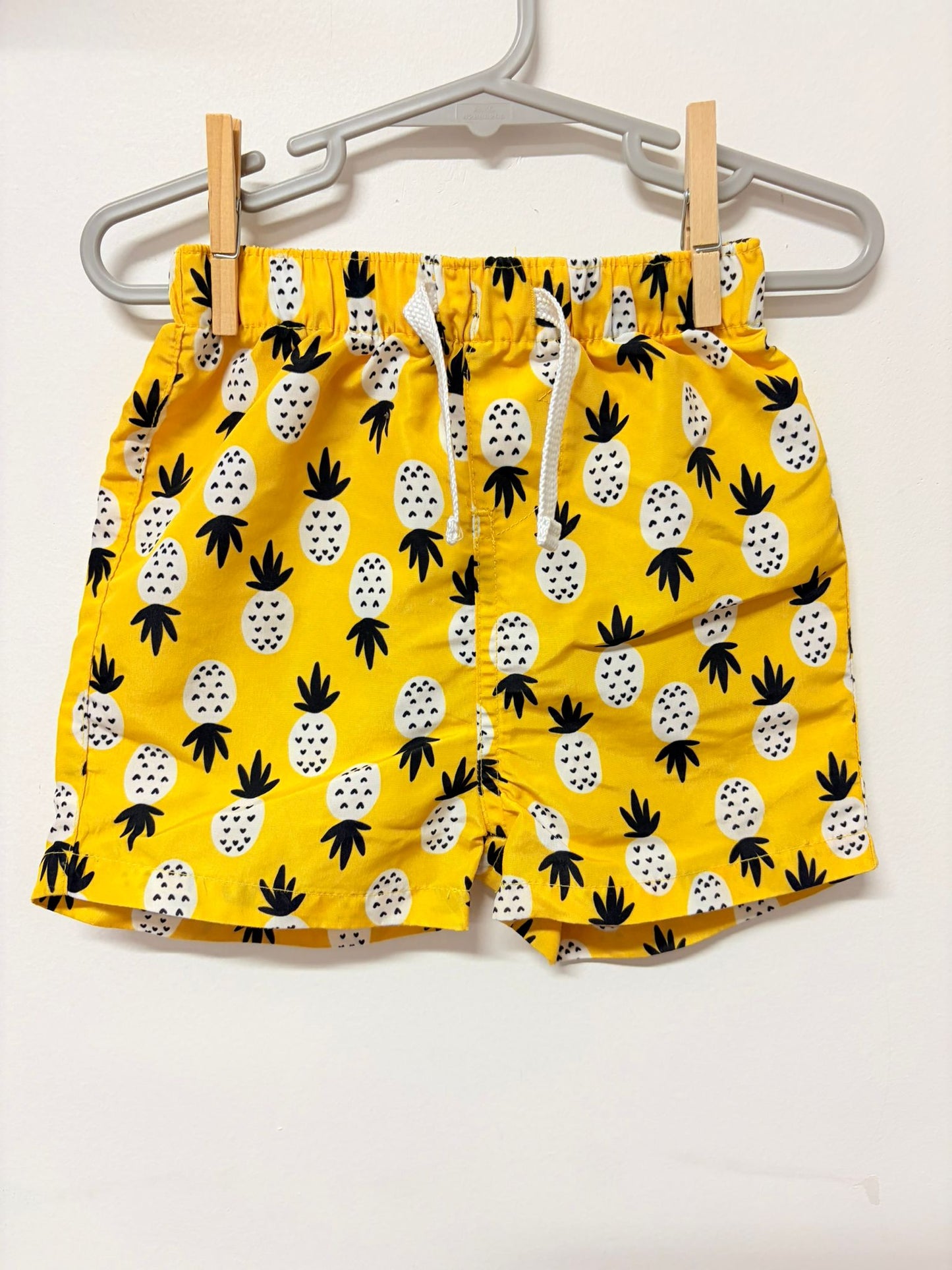 Size 2 Dymples yellow pineapple shorts.