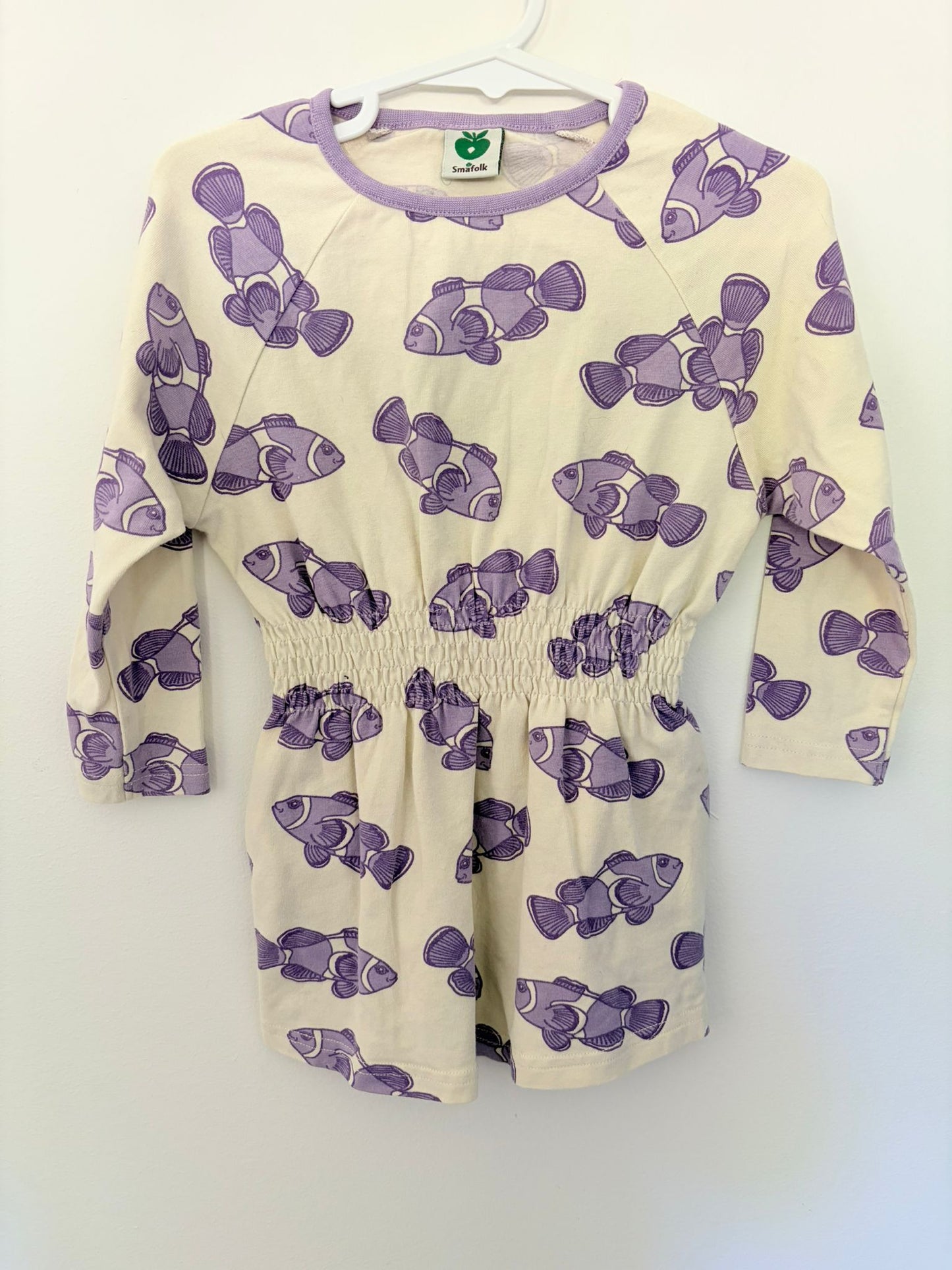 Size 2 SMAFOLK Scandi brand cream dress with purple fish.