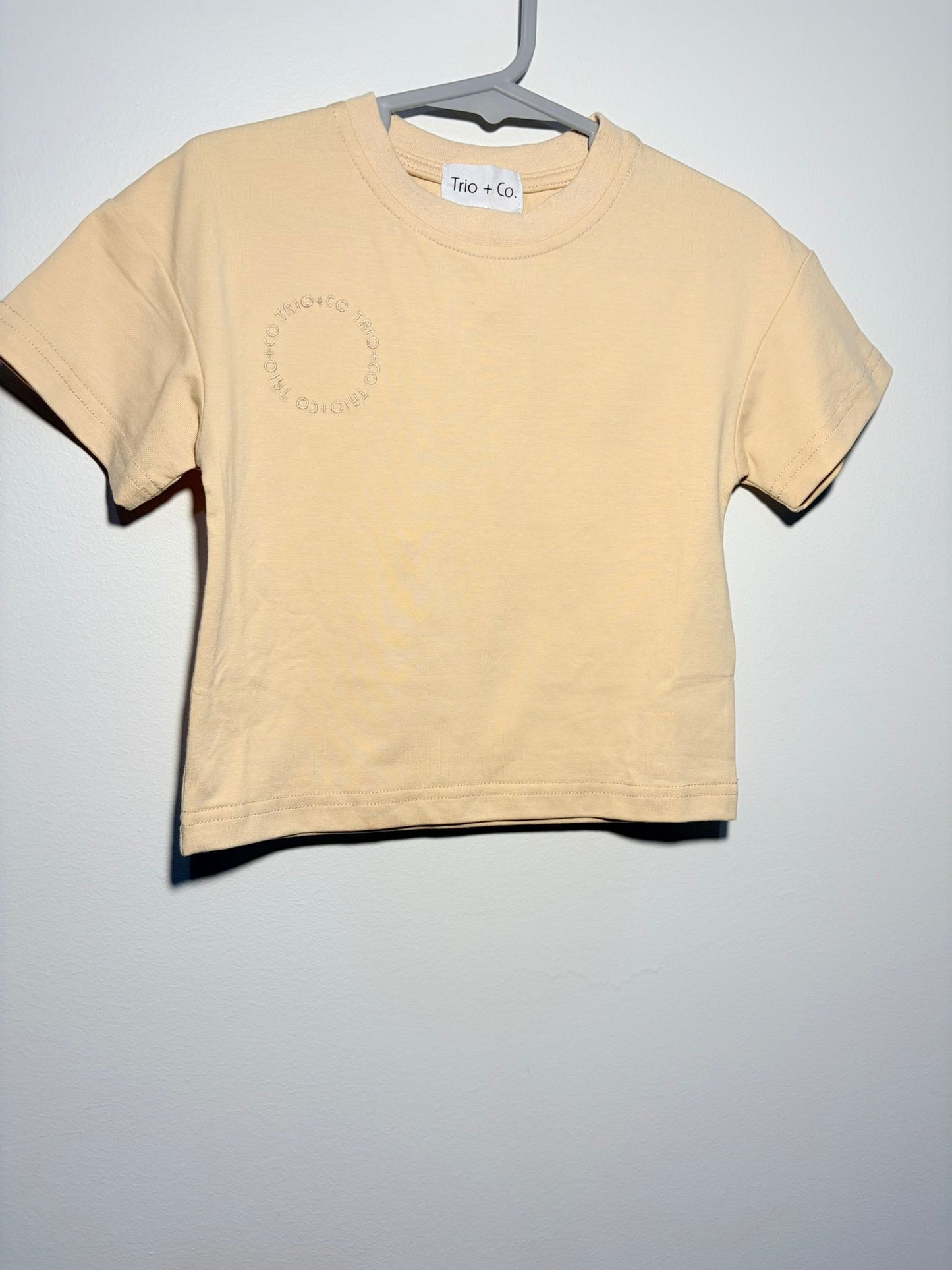 0 Trio & Co. oversize sand T-shirt.