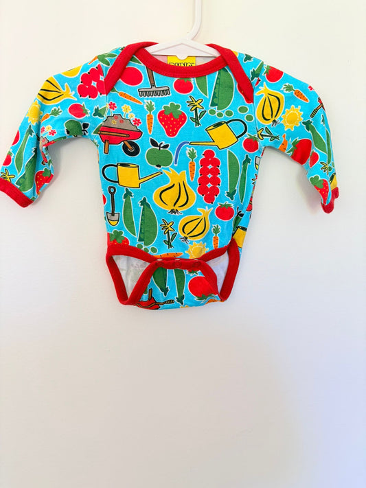 Size 0000 Duns long sleeved bodysuit turquoise garden print.
