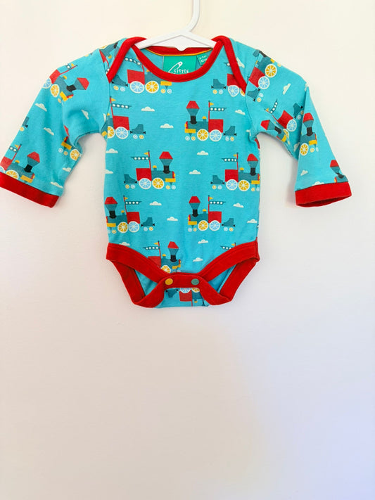 Size 000 Little green radicals teal train print long sleeved bodysuit.