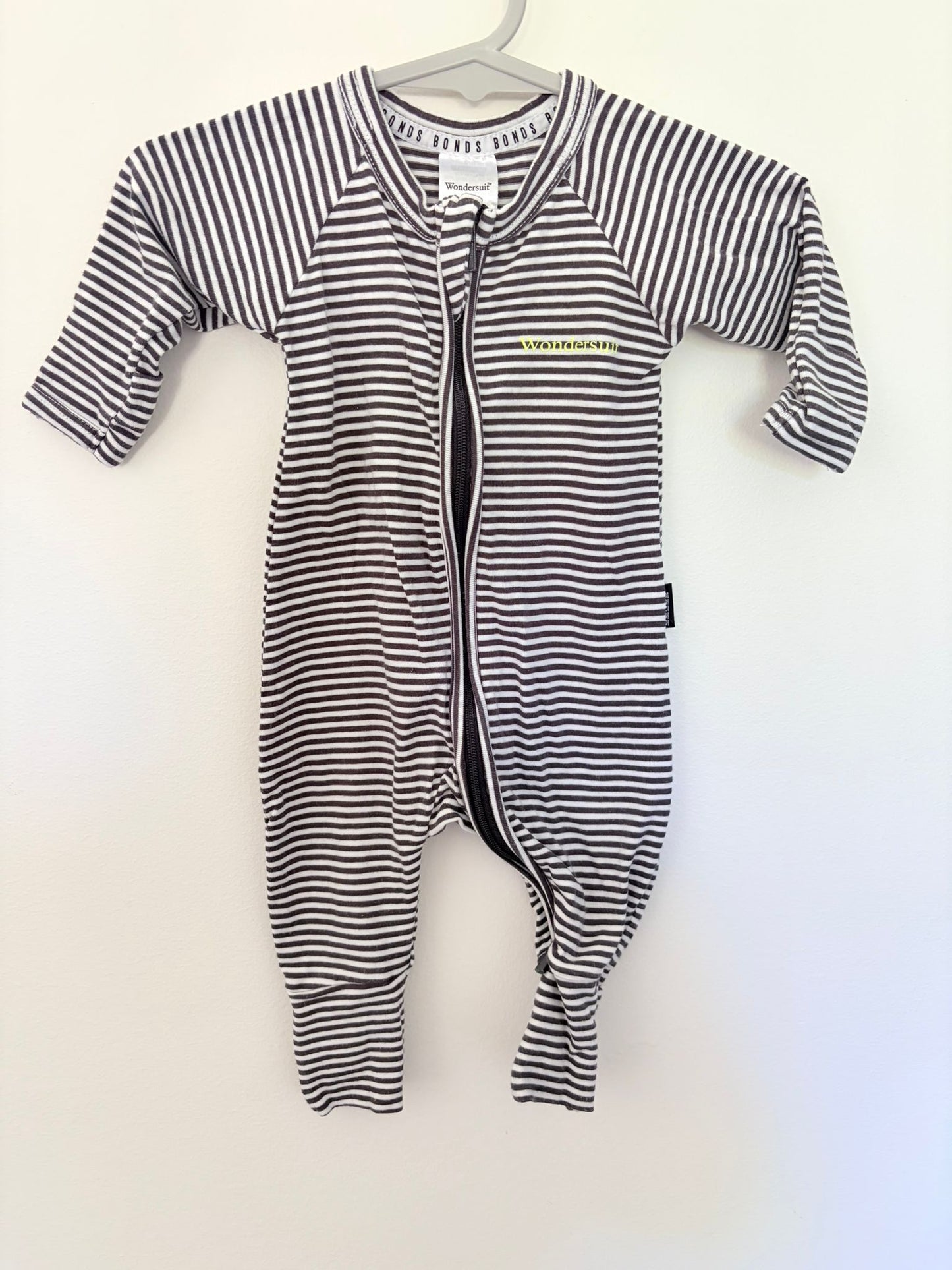 Newborn Bonds wondersuit black/white stripe.