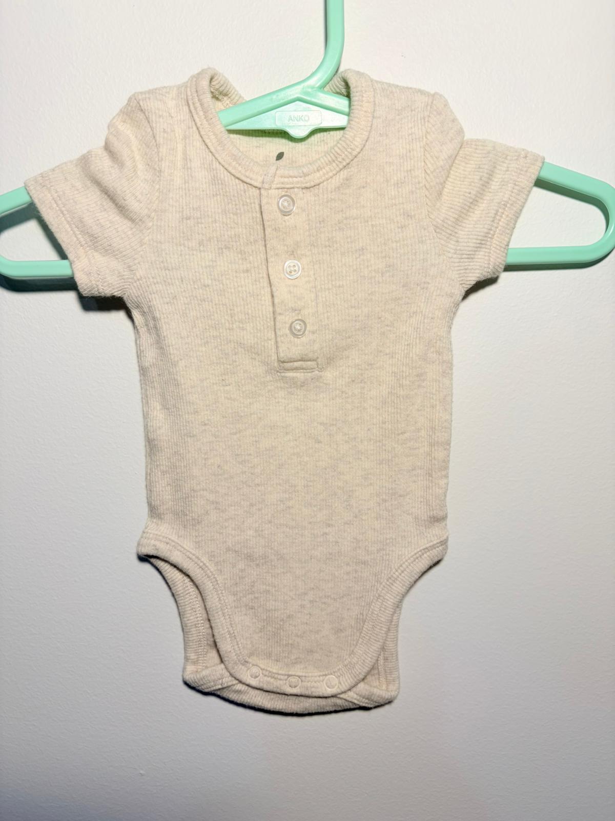 0000 Country Road oatmeal short sleeve bodysuit.