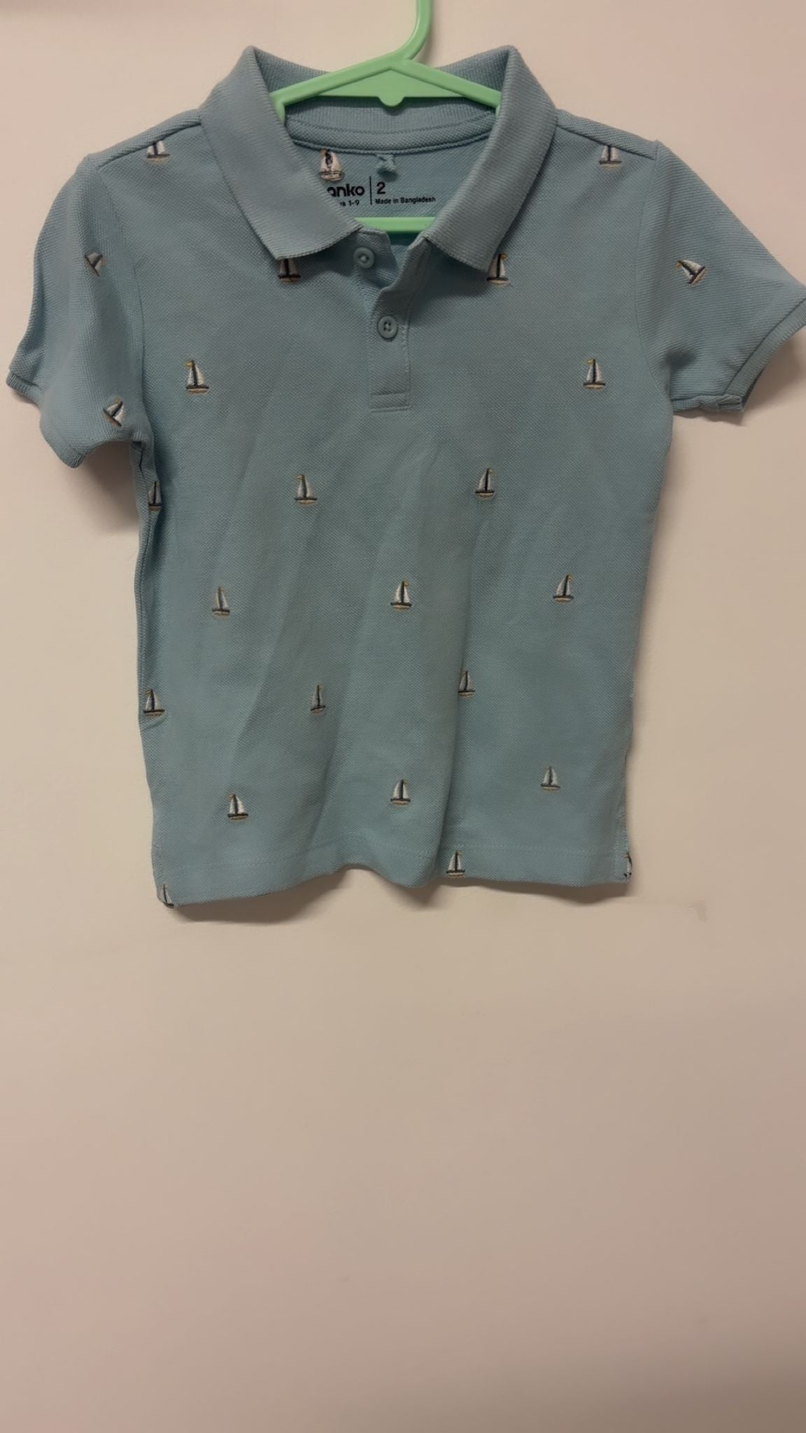 Size 2 Anko boat embroidery pastel blue T-shirt.