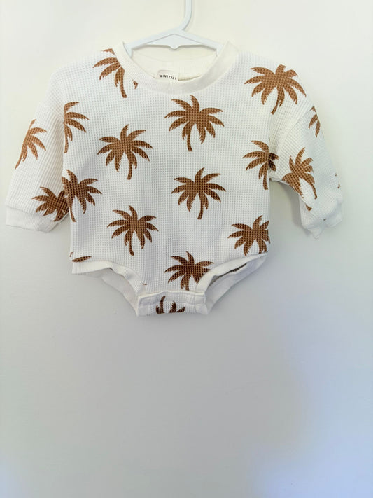 Size 000 Mini Zali white waffle long sleeve bodysuit with palm trees.