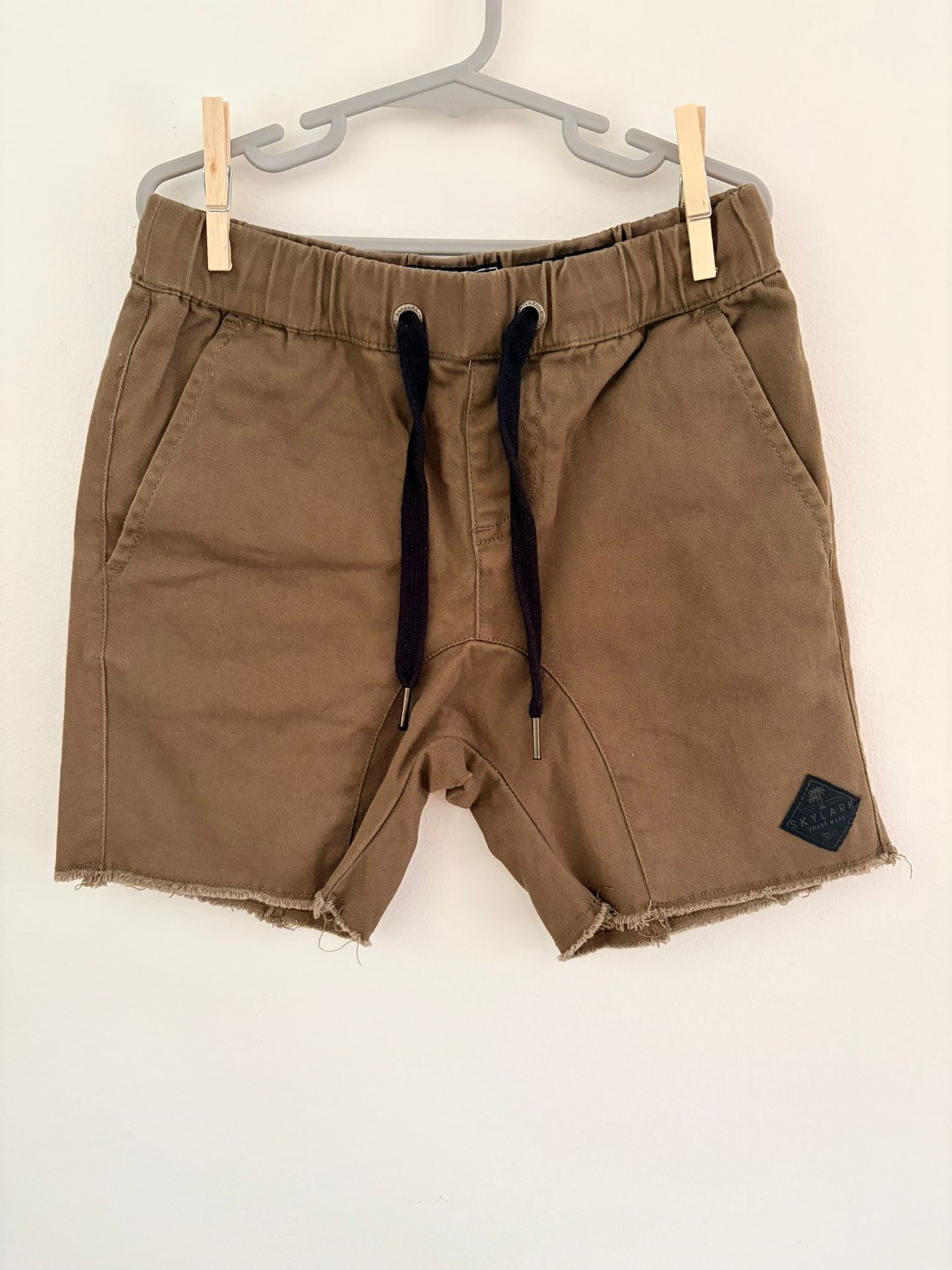 Size 6 (more like 7/8) dark olive green shorts.