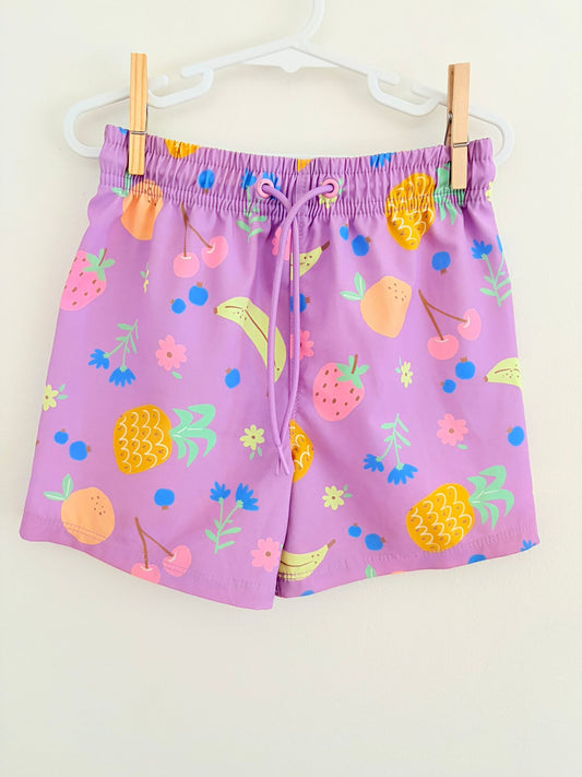 Size 5 Target board shorts, lilac with fruit print.