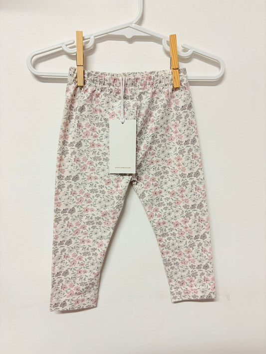 Size 00 (New with tags) Jamie Kay white leggings with floral print.