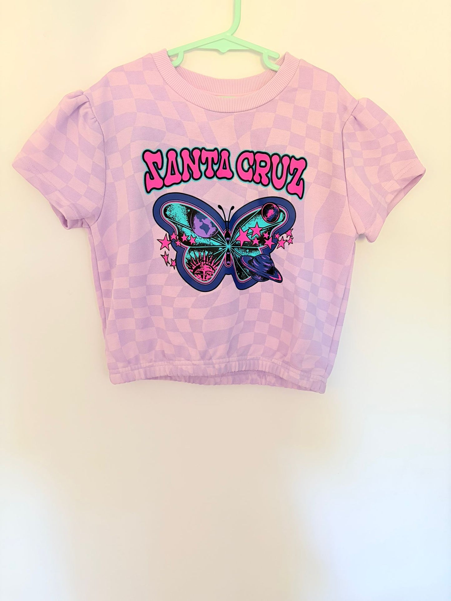Size 10 Santa Cruz short sleeve jumper lilac butterfly print.
