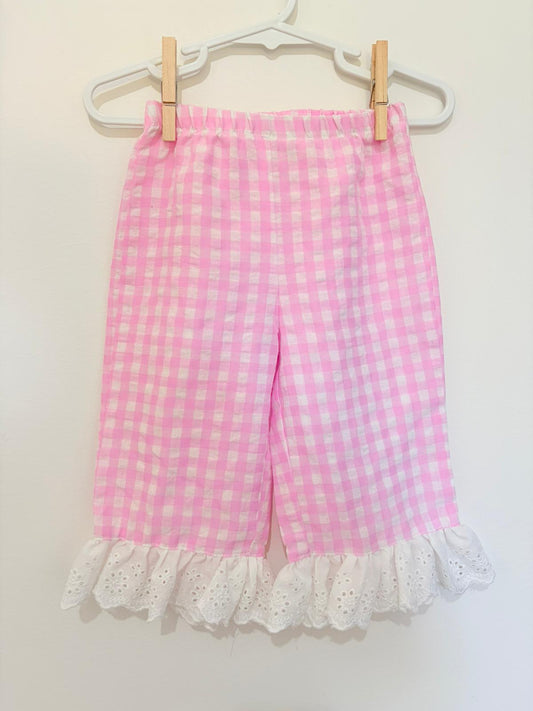 Size 0 Cozy pixies pink check pants.