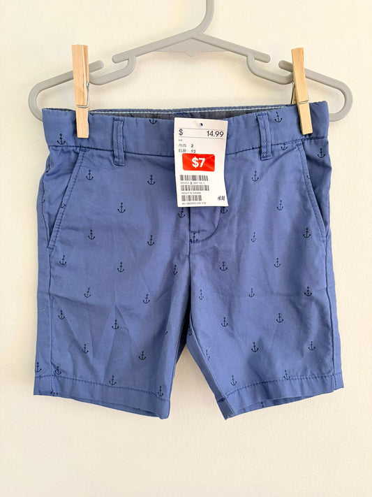 Size 2 (New with tag) H&M blue anchor shorts.
