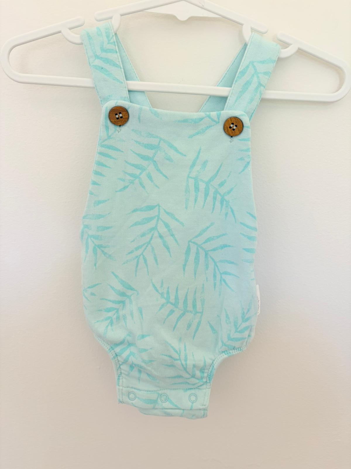 000 Purebaby overall romper light green floral pattern.