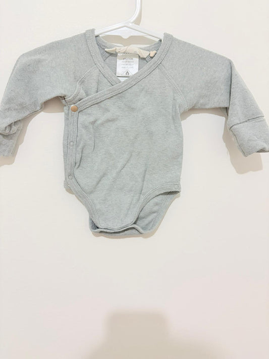 0000 Susukoshi long sleeve pastel green bodysuit.