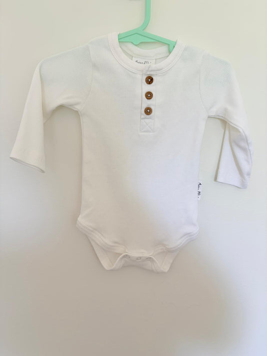 00 Aster & Oak long sleeve button up white body suit.