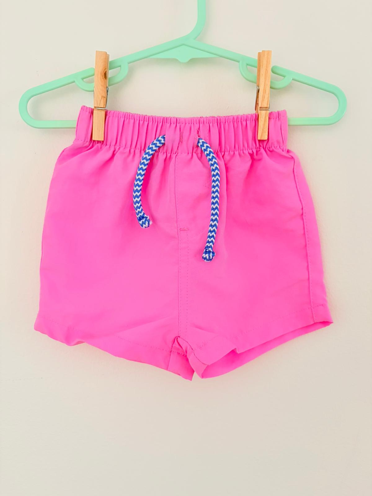 Size 00 Dymples pink board shorts.
