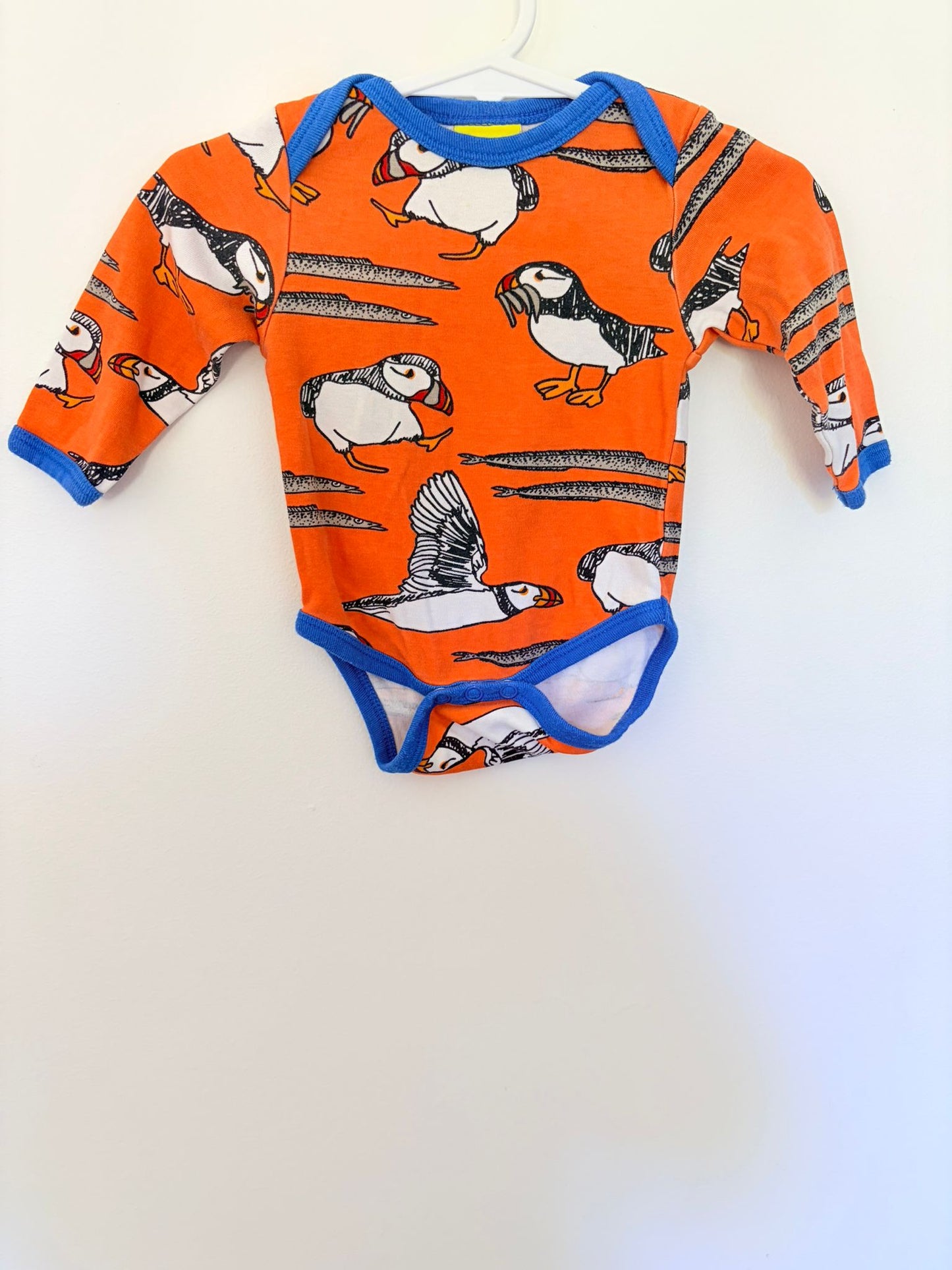 Size 000 Duns Sweden long sleeved bodysuit orange puffin print.