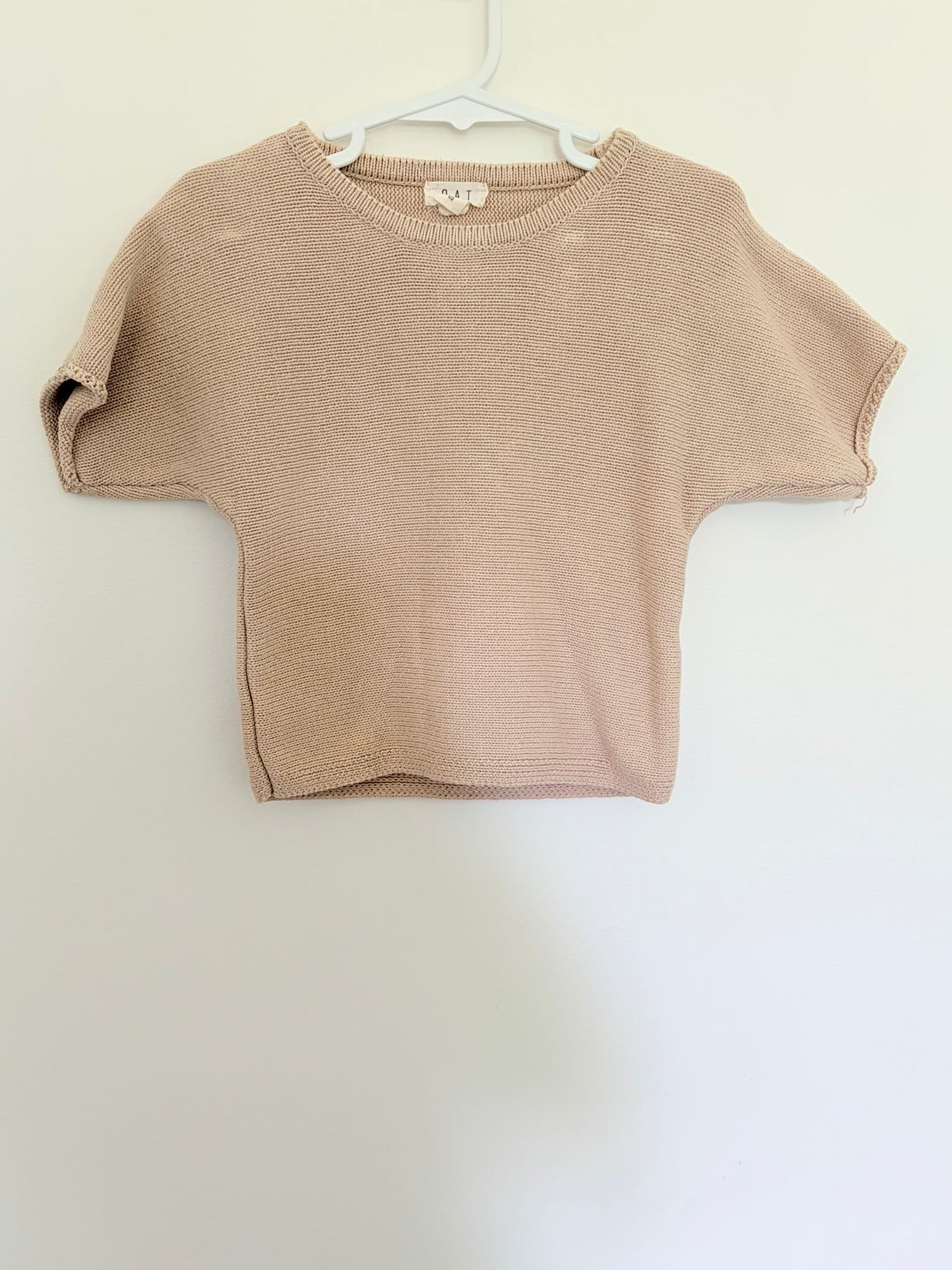 Size 1-2 OAT beige knit top.