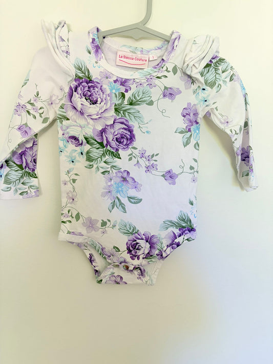 Size 1 La Sienna bodysuit white/purple bold floral print.