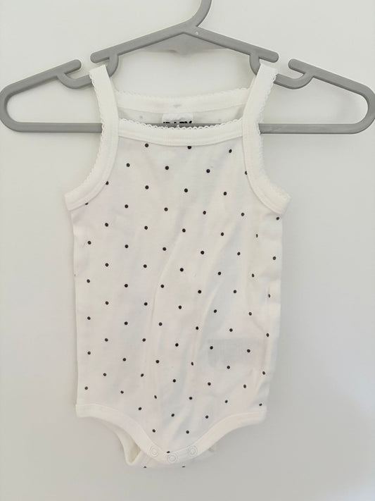 Size 000 Cotton on baby sleeveless body suit.