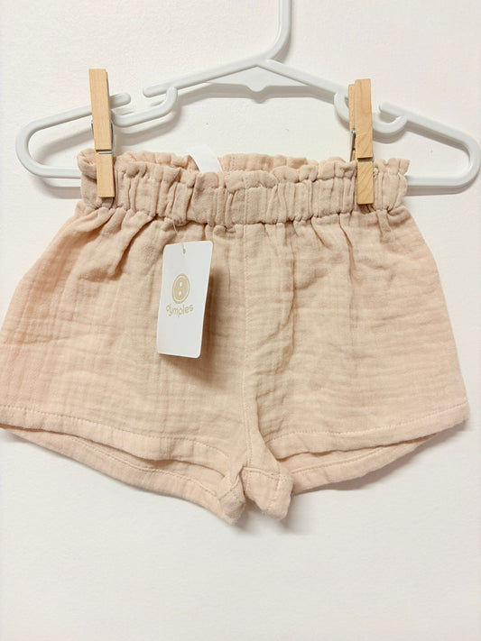 Size 0 (New with tags) Dusty pink linen shorts.