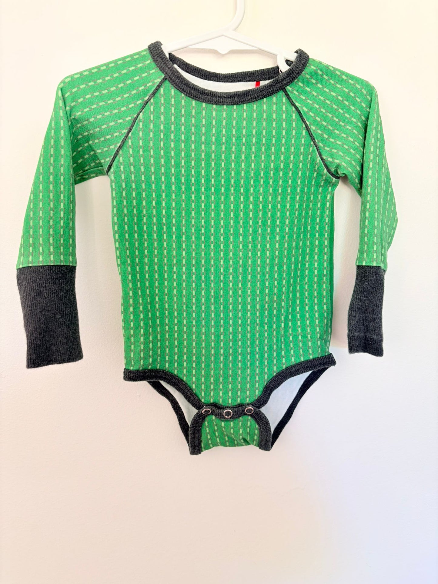 Size 0 ALABABY long sleeved green Scandi bodysuit.