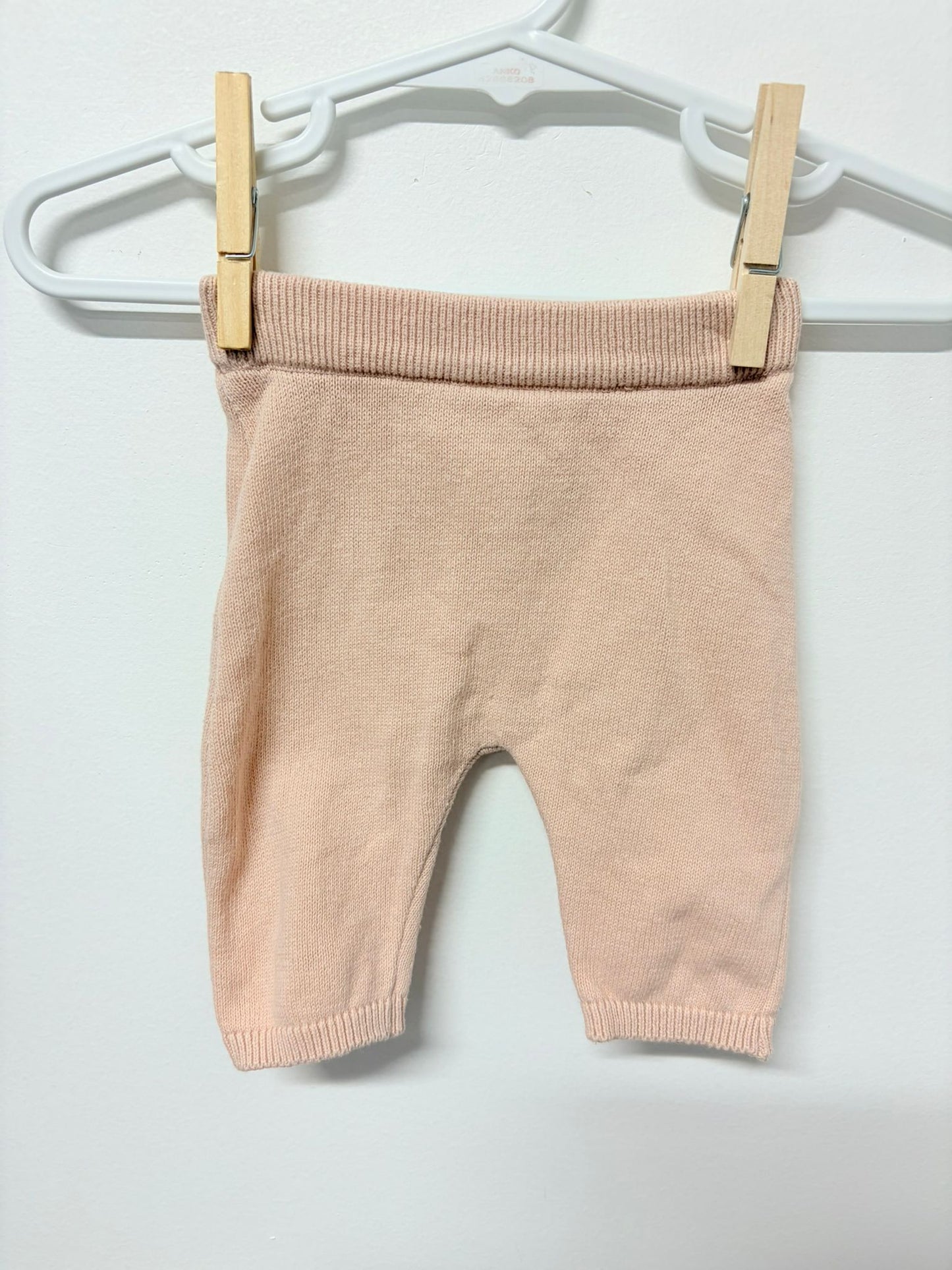 Newborn H&M knitted peach pants.